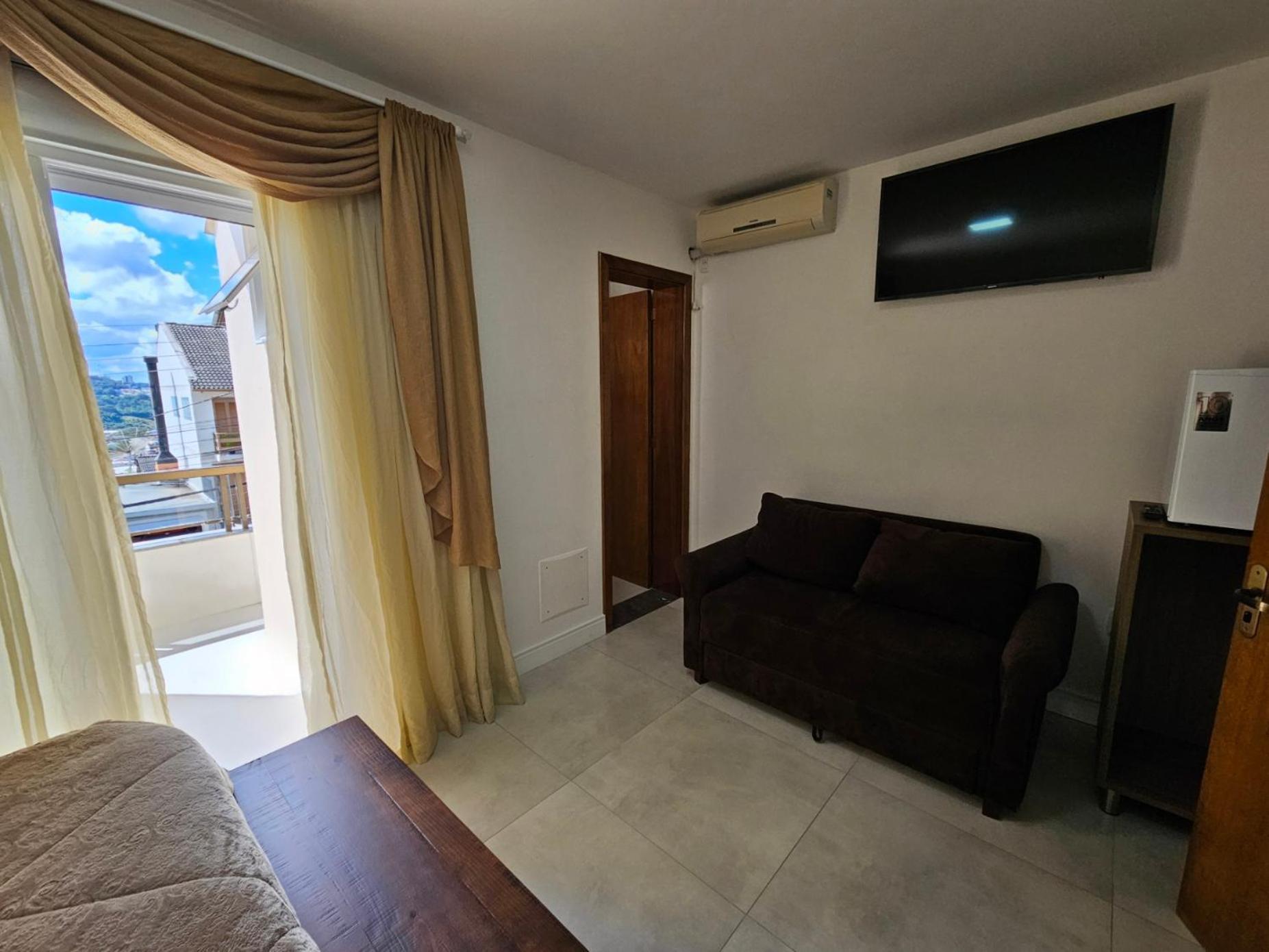 Pousada Lugama Bento Gonçalves Quarto foto